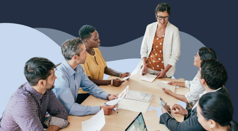 People sharing ideas around a meeting table